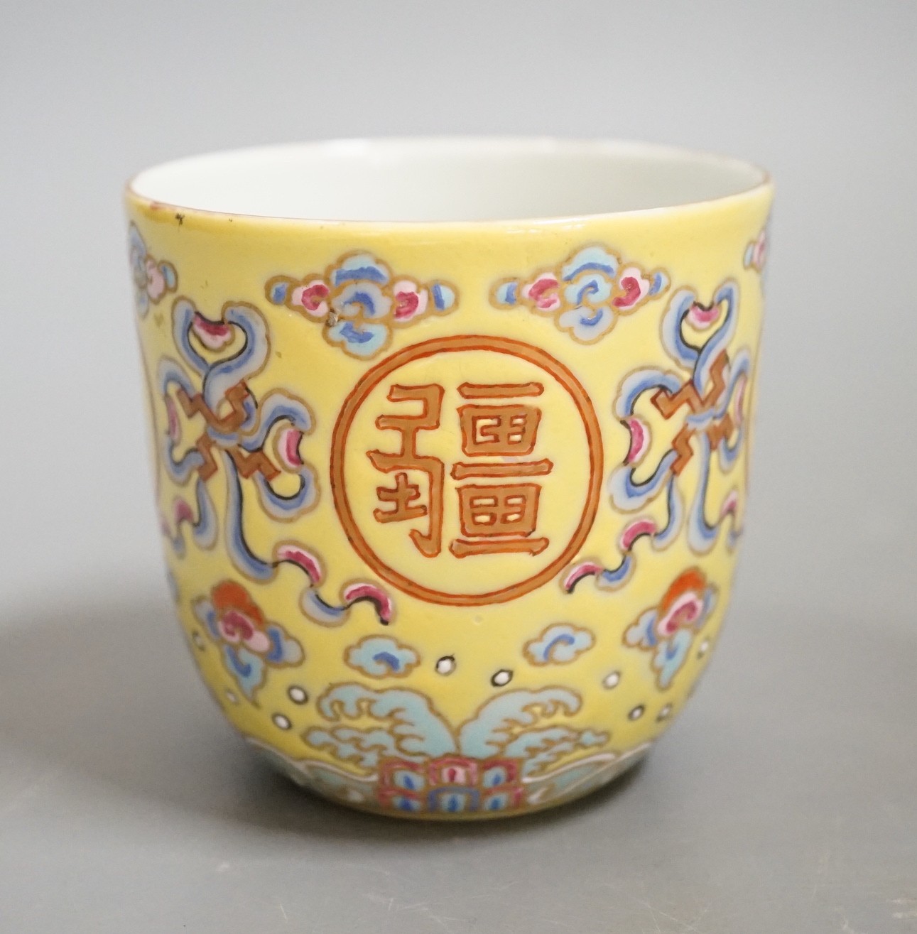 A Chinese enamelled porcelain cup, 7cms high